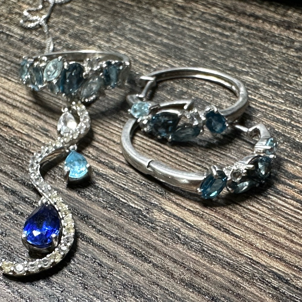 Silver and topaz necklace, ring and earrings